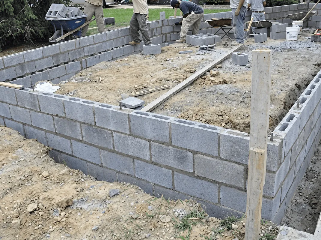 Professionals building a foundation with blocks in Pueblo, CO