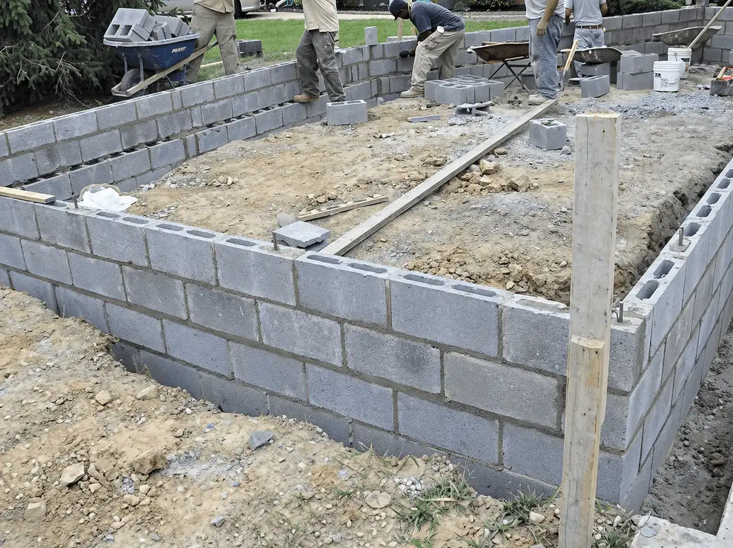 Professionals building a foundation with blocks in Pueblo, CO