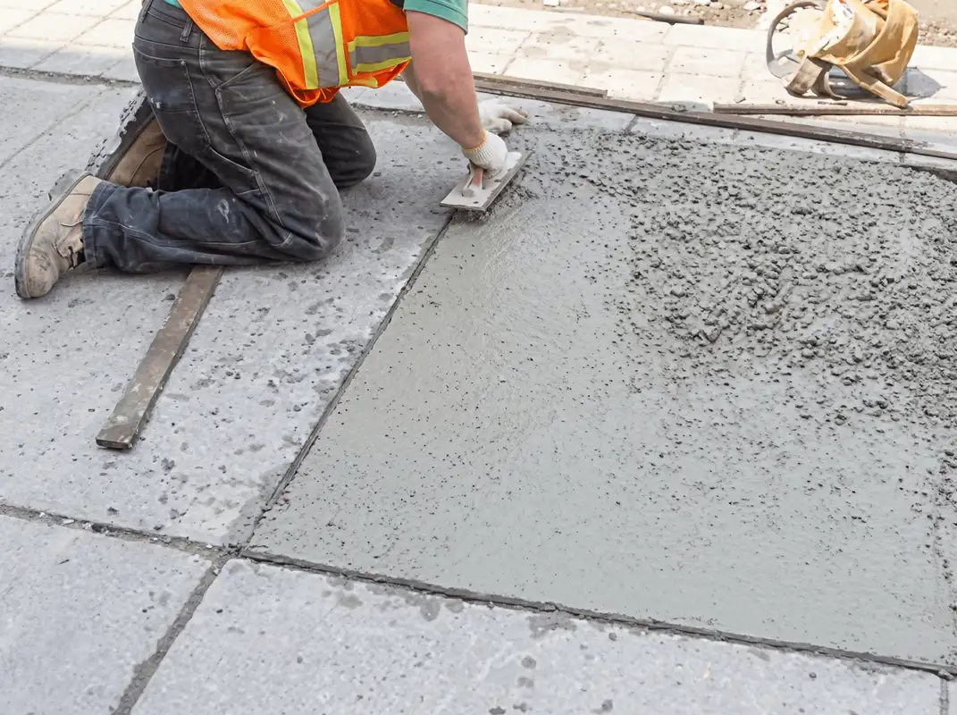 Professional repairing a concrete floor in Pueblo, CO