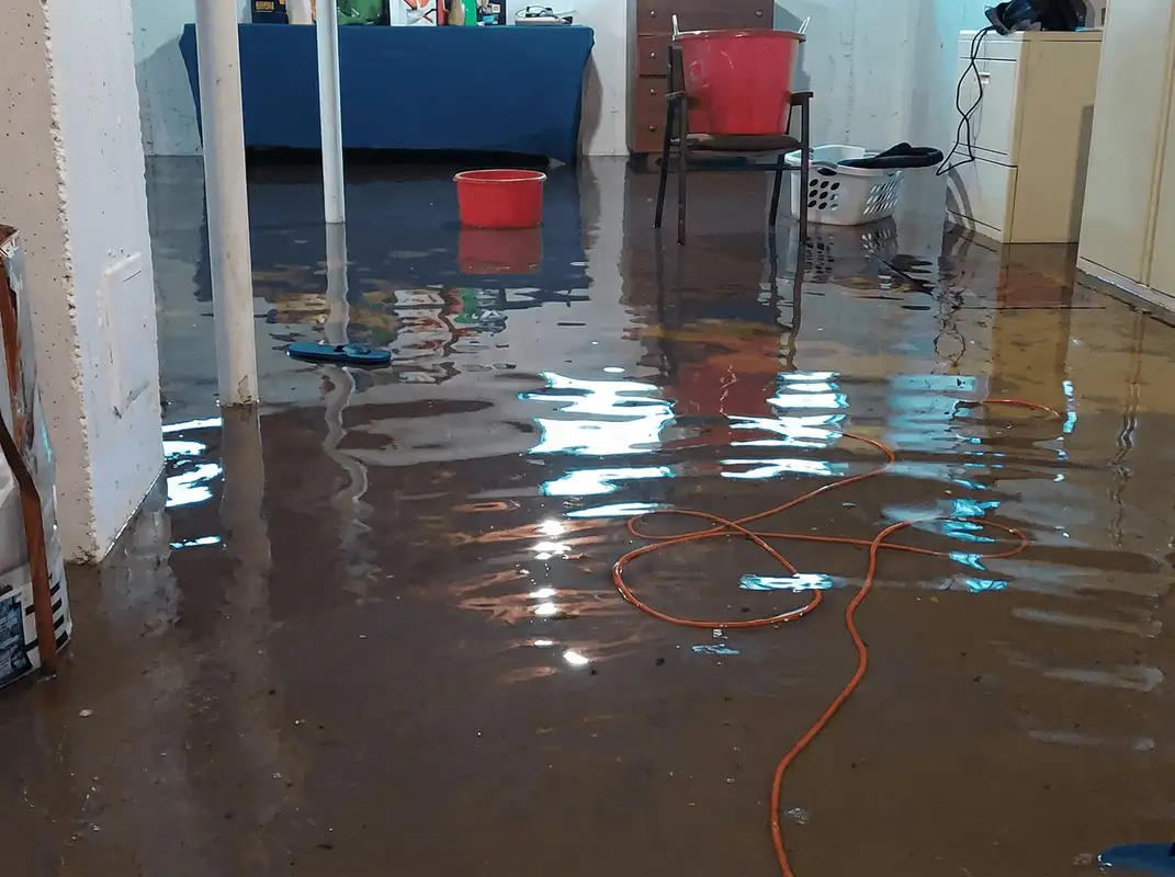 Basement with boiler, cabinets and washing machine completely flooded in Pueblo, CO